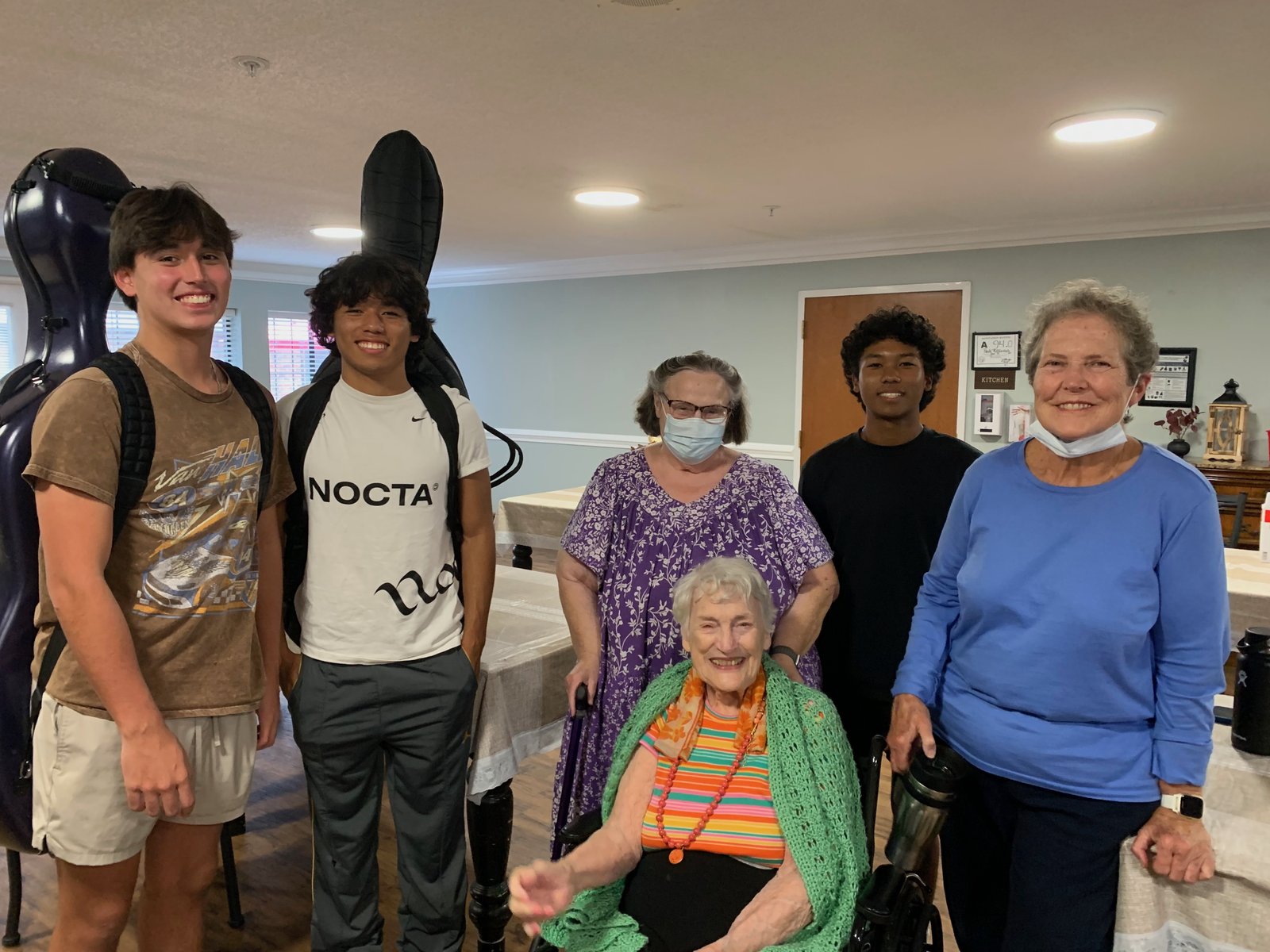 Music & Light musicians with residents and staff after a performance